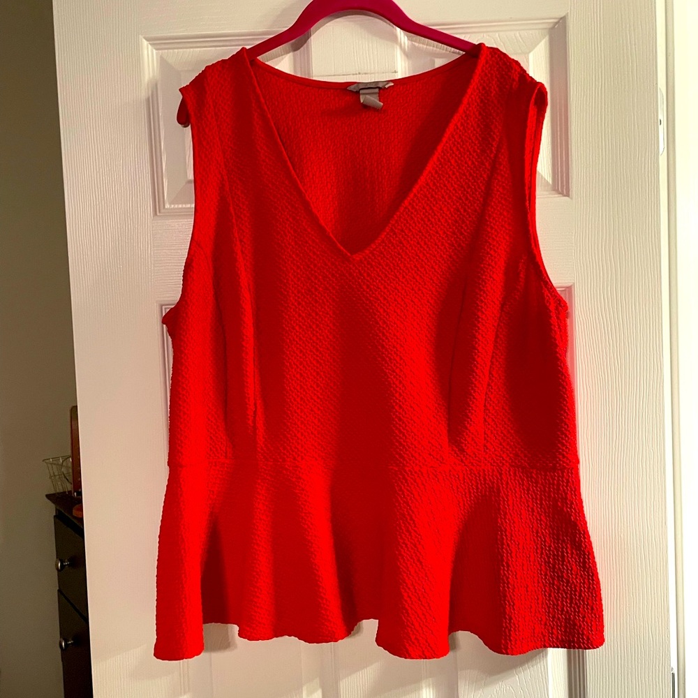 H&M plus size red shirt. Very light material and very flattering.